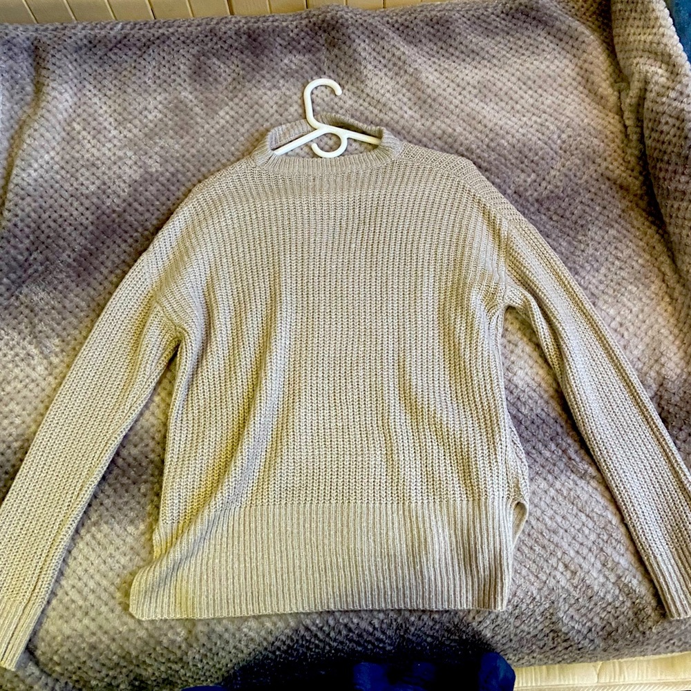 Be Cool sweater in a size L in the color gray, it’s new and never been worn.